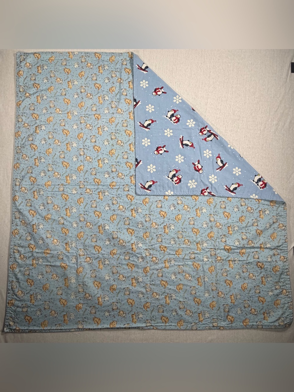 Light Blue Reversible Penguin & Animal Print Quilt Throw